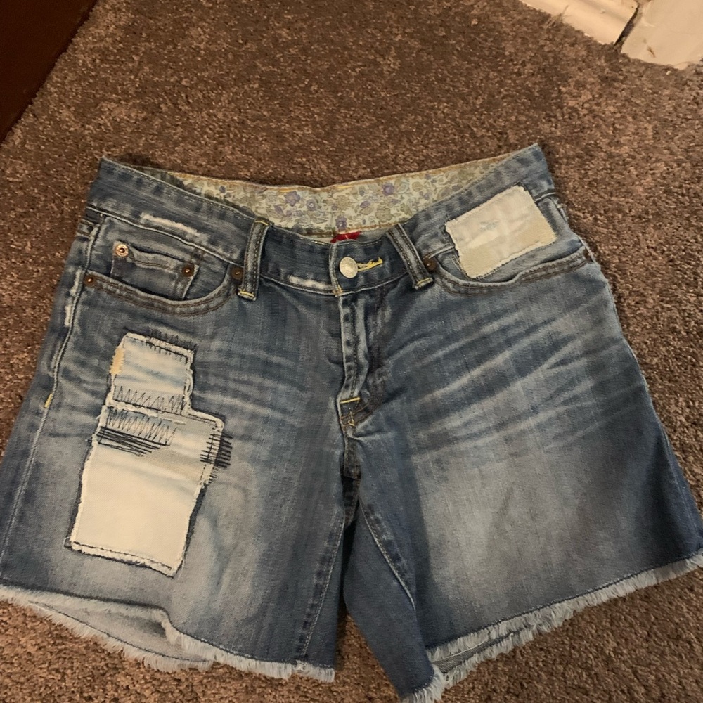 Size 2 lucky brand shorts with patches sewn on